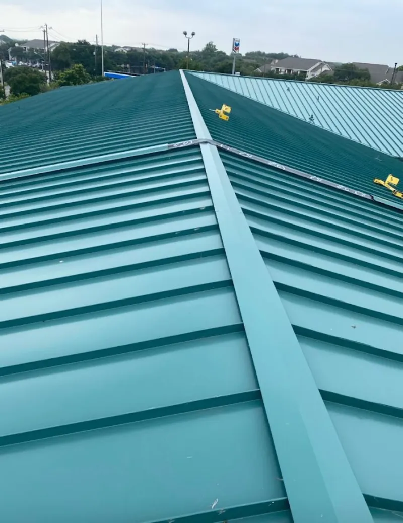 Green commercial metal roof ridge and valley for Metal Roof Repair in Busti